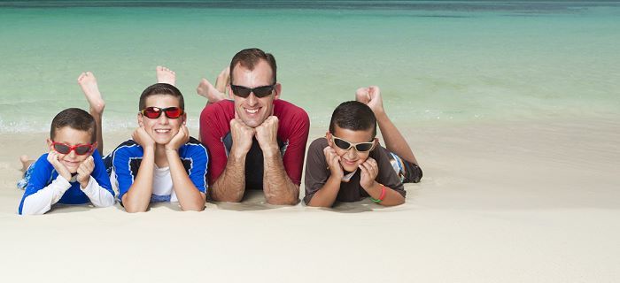 Father with his children at the beach