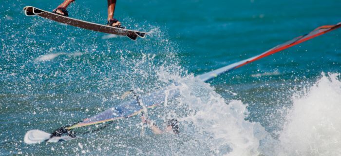 Kitesurfer and Windsurfer together on the water