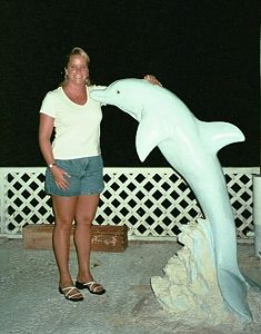 Standing next to a Dolphin