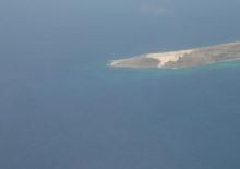 seat in the plane with a great view of Aruba